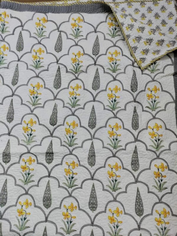 Hand Block Printed machine quilted reversible bedcover with Two quilted pillow covers