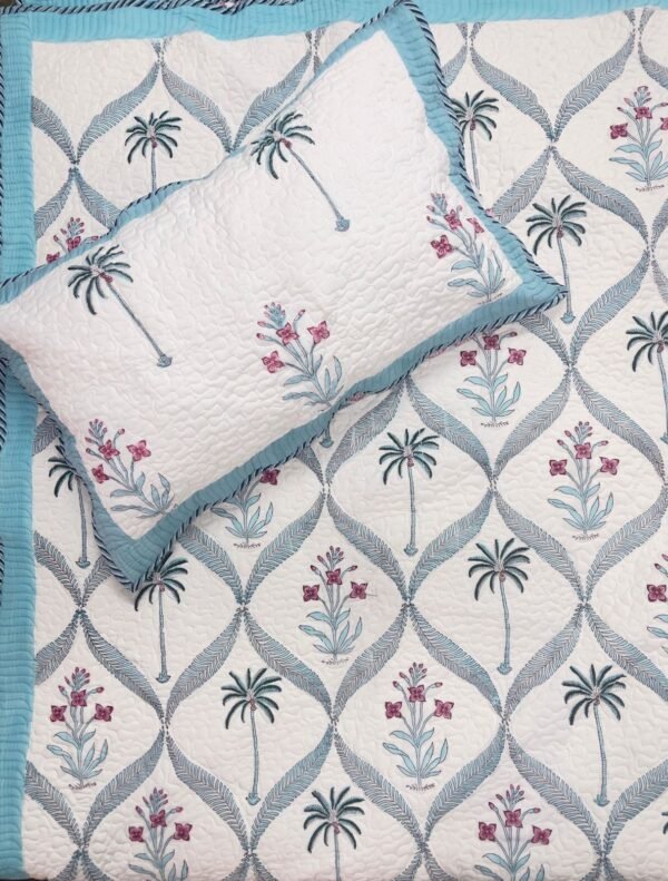 Hand Block Printed machine quilted reversible bedcover with Two quilted pillow covers