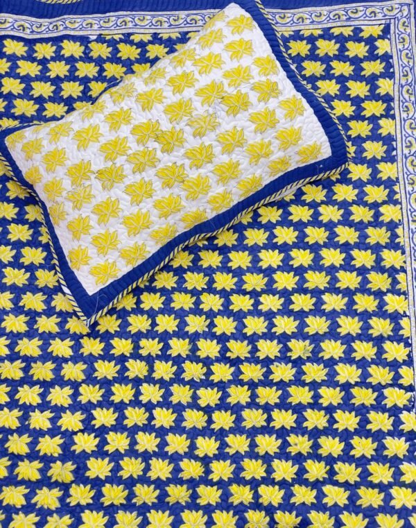 Hand Block Printed machine quilted reversible bedcover with Two quilted pillow covers